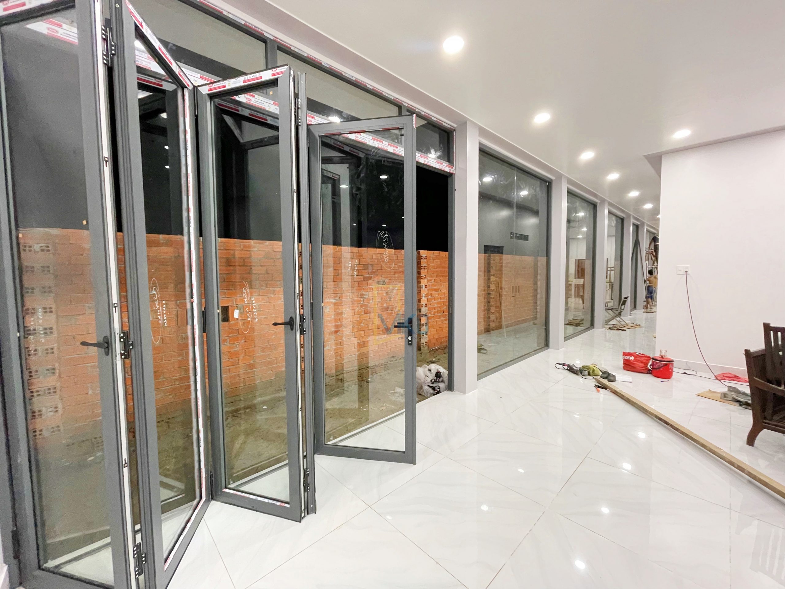 Cửa ĐI Xếp Trượt - Nhôm Xingfa Cửa ĐI Xếp Trượt - Nhôm Xingfa